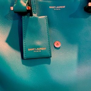 Saint Laurent Paris turquoise bag.